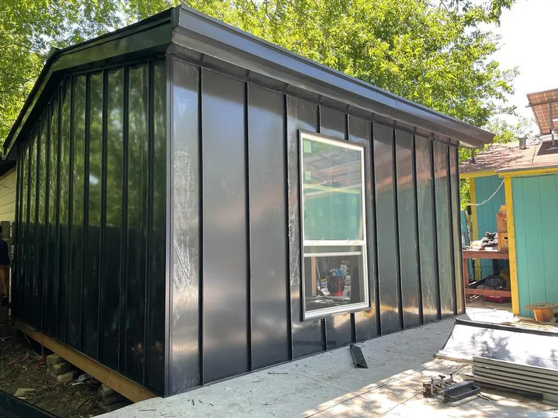 Black standing seam metal wall panels for Metal Roof Installation in Ocean Springs